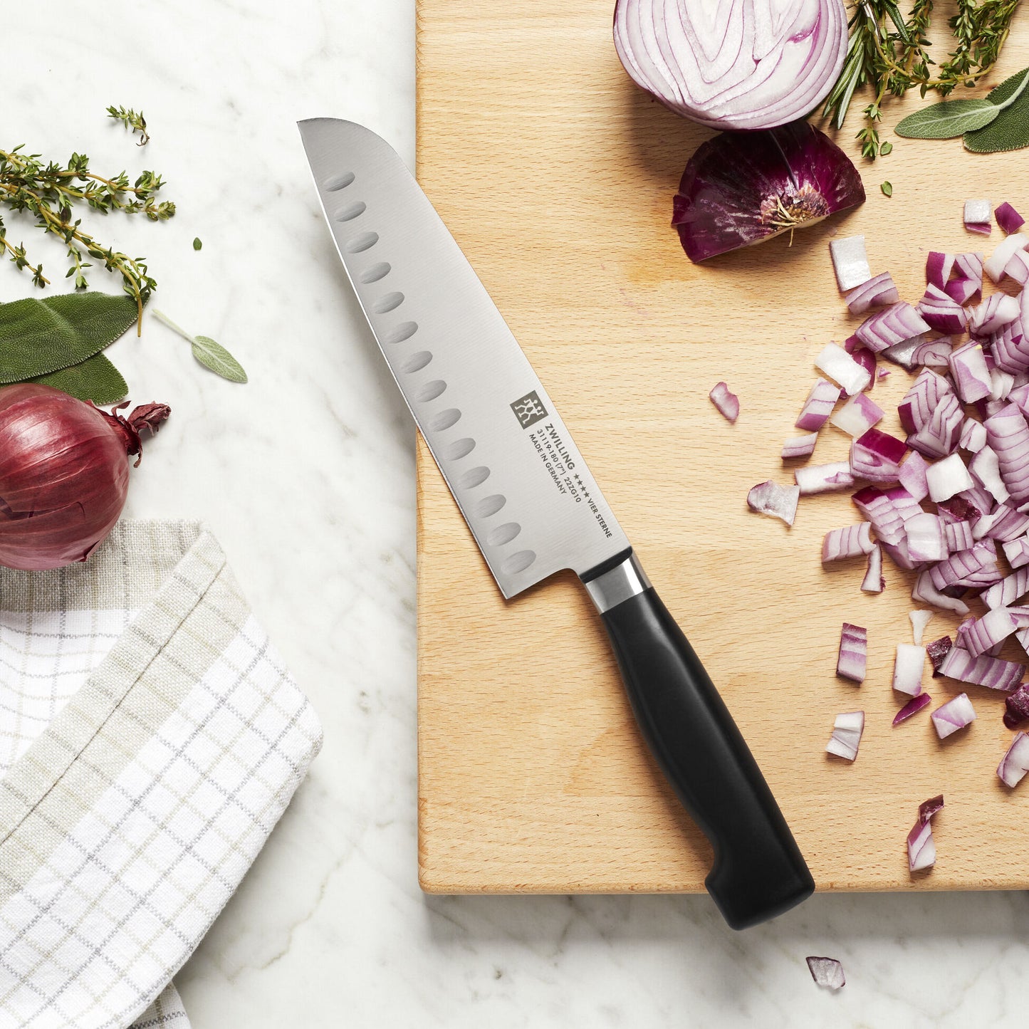 Zwilling Four Star 7" Santoku Knife (RAINCHECK)